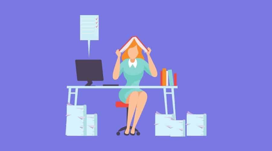 Free Marketing is Never Free by Third Angle overwhelmed woman at desk with paperwork